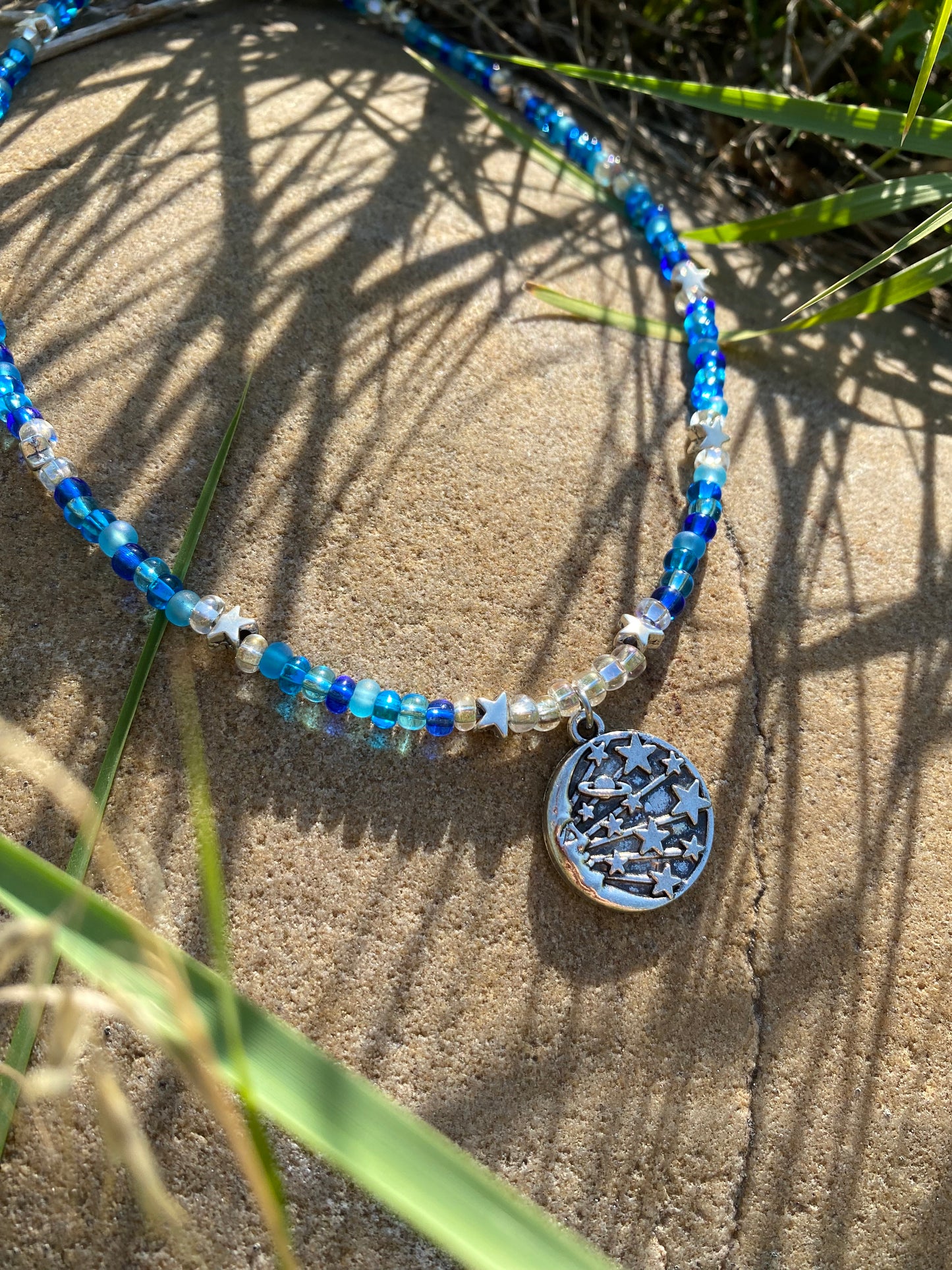 Blue Phases Moon, Stars and Planet Beaded Silver Charm Necklace